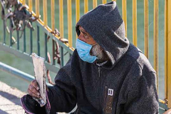 Homeless Man With Mask